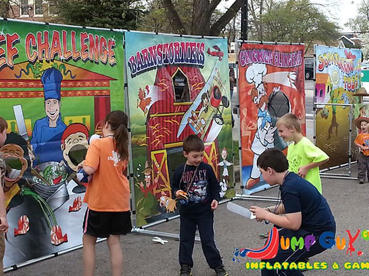 Kids playing carnival game rentals at a Chicago school carnival